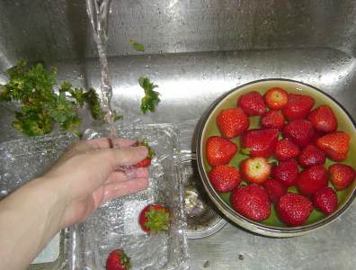 [washing strawberries]