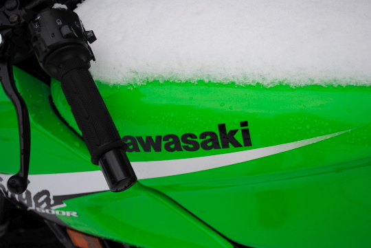 [snow, and kawasaki logo on ex500]