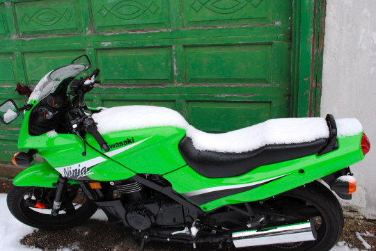 [snow-backed motorcycle]