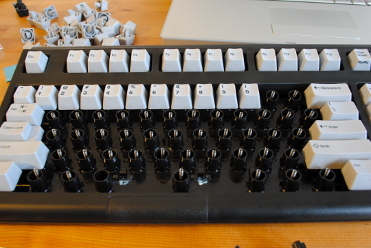[half of the keycaps pulled from keyboard]